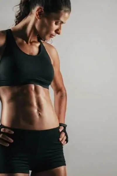 Toning Up at Home: The Ultimate Guide to Bodyweight Exercises 2 Image of woman's toned stomach after bodyweight exercises Arundel and non-surgical treatment from Lipo 360