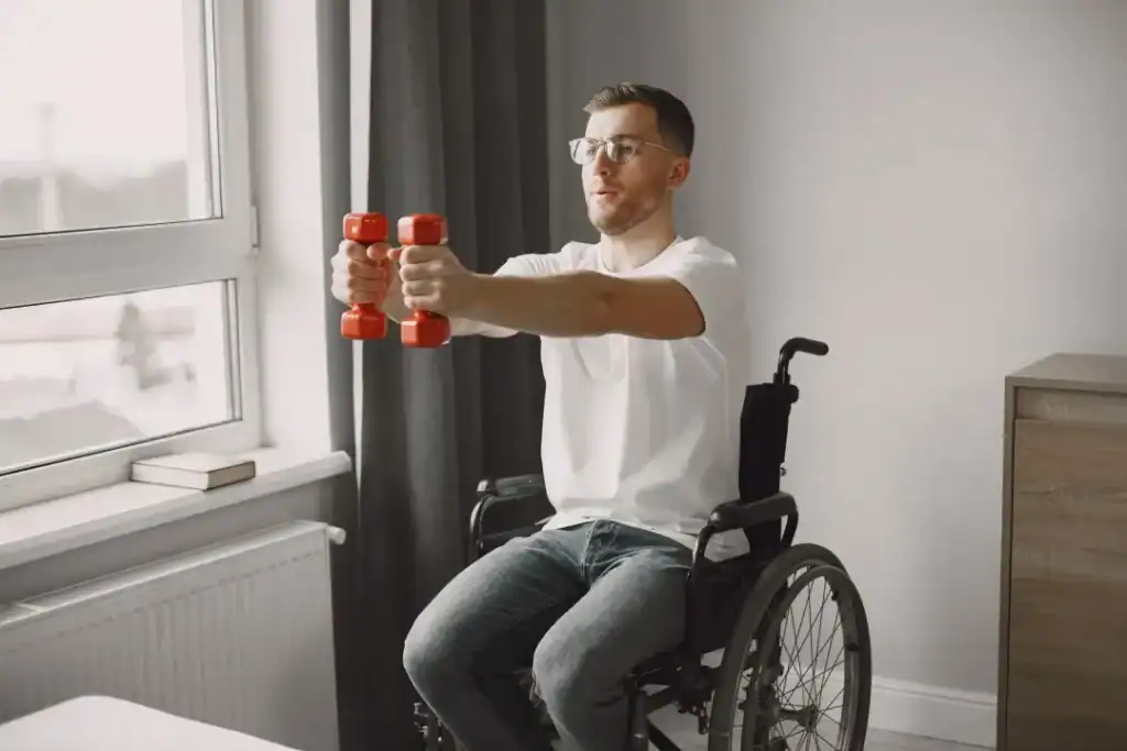Image of man doing exercise in his wheelchair to aid weight loss Arundel