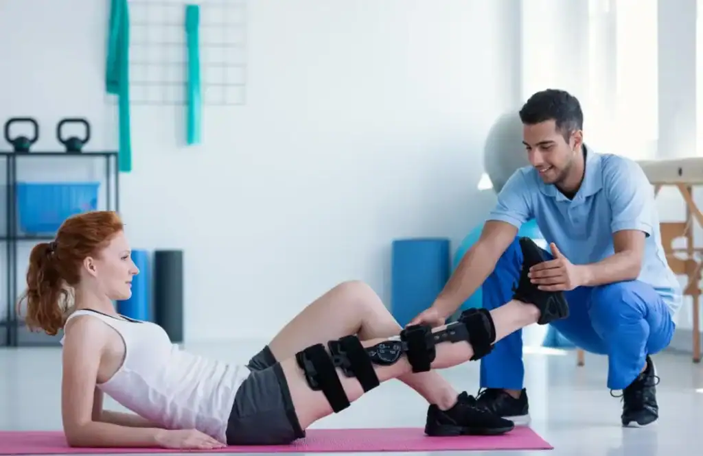 Woman having treatment to help muscle recovery Arundel after an injury